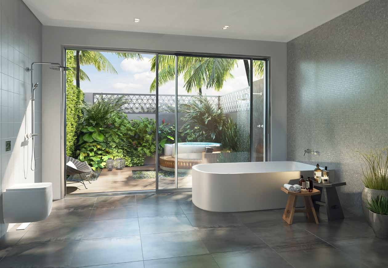 Boutique bathroom with a freestanding bath and a private botanic courtyard